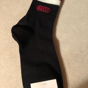 Gucci socks. Fits shoe size 6 to 11. New.